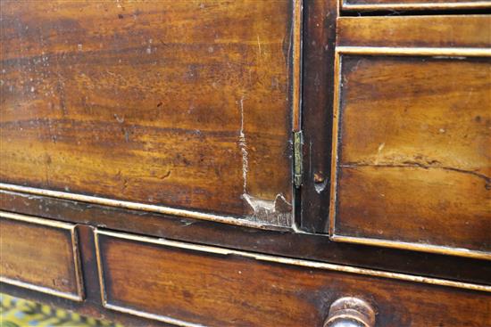 A Regency mahogany washstand with cistern compartment and basin recess W.94cm.